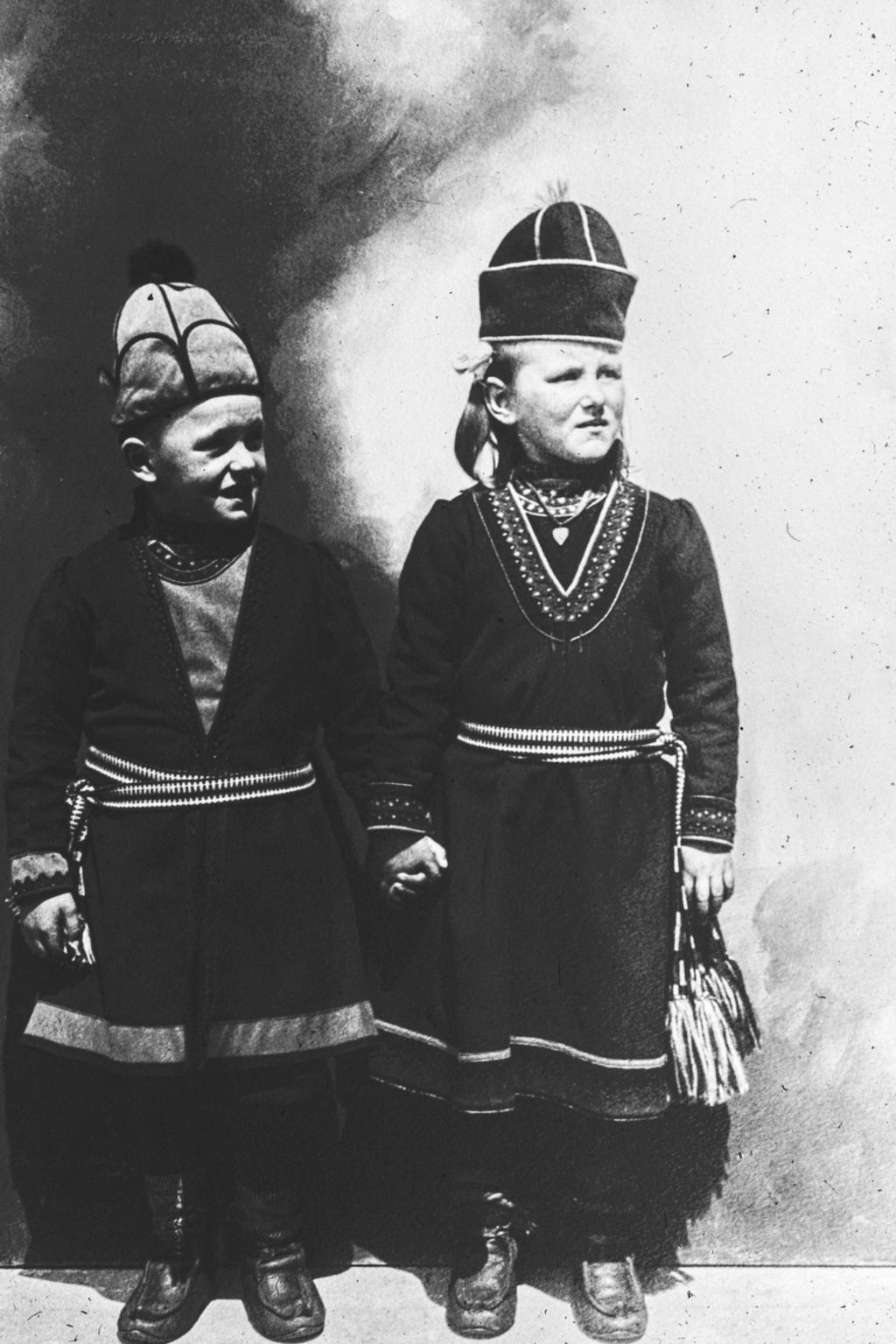 Sami children, holding hands